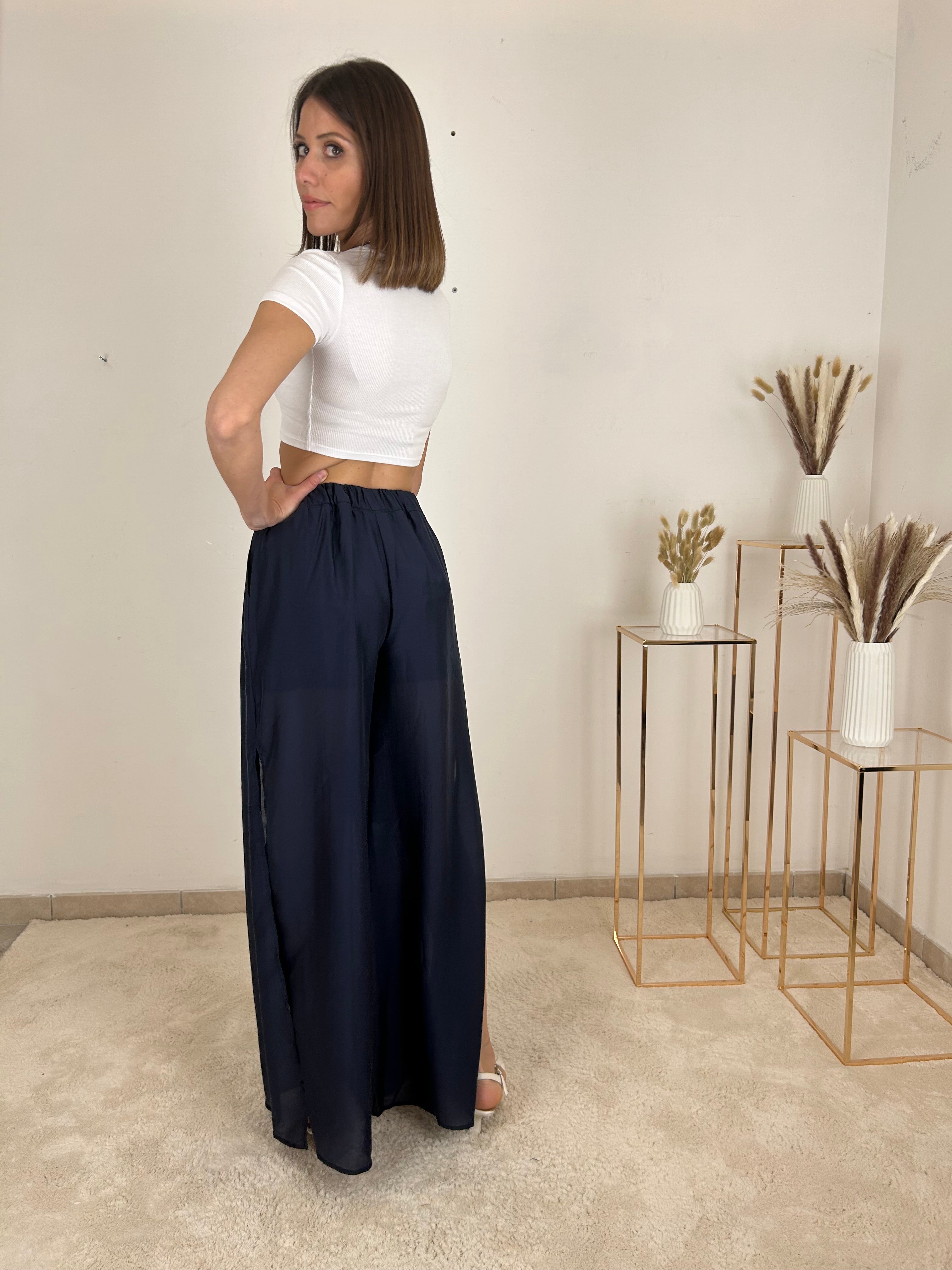Pantaloni larghi con tasche laterali